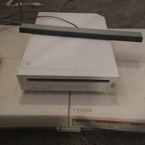 wii fit board, wii console and dvds